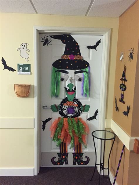 Protect your home from evil spirits with a witch illustration door shield this Halloween